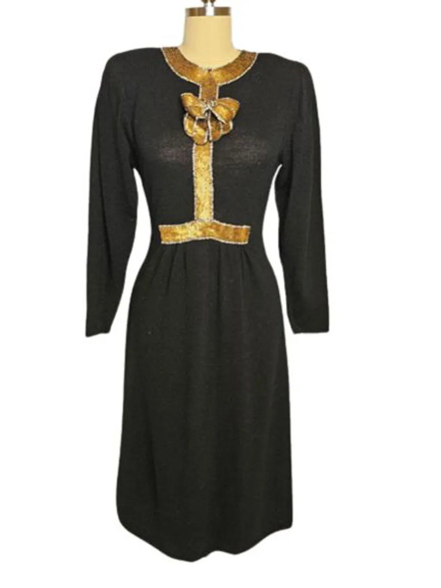 *  VINTAGE LILLIE RUBIN BLACK KNIT EVENINGS DRESS WITH HUGE GOLD AND SILVER SEQUIN BOW ACCENTED WITH SPARKLING RHINESTONES